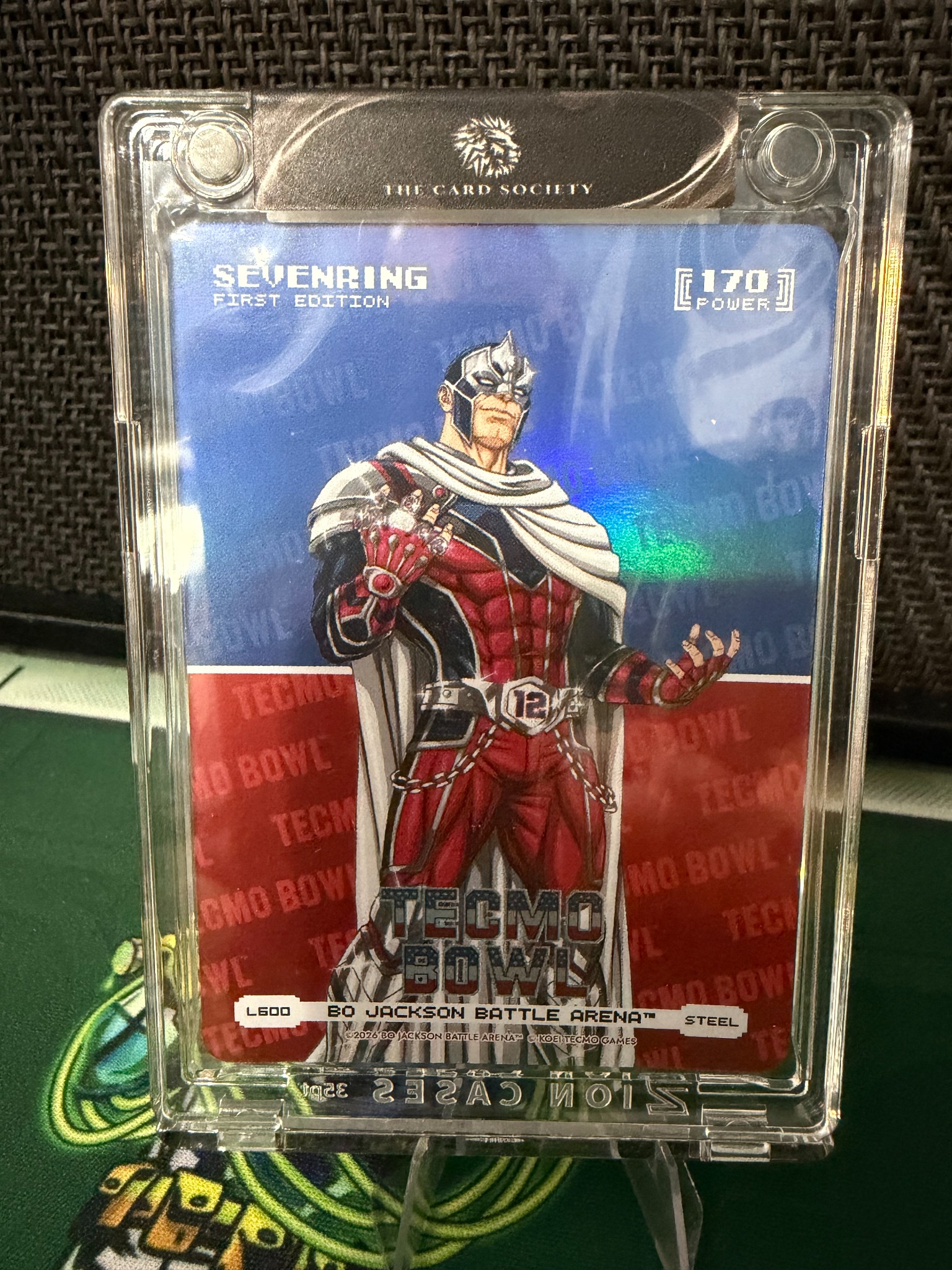 SevenRing first edition Tecmo Bowl Steel BOBA card in a magnetic holder